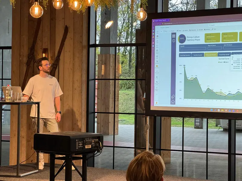 A speaker walking through a chart during a session